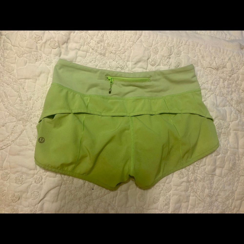 Lululemon lime green running shorts.